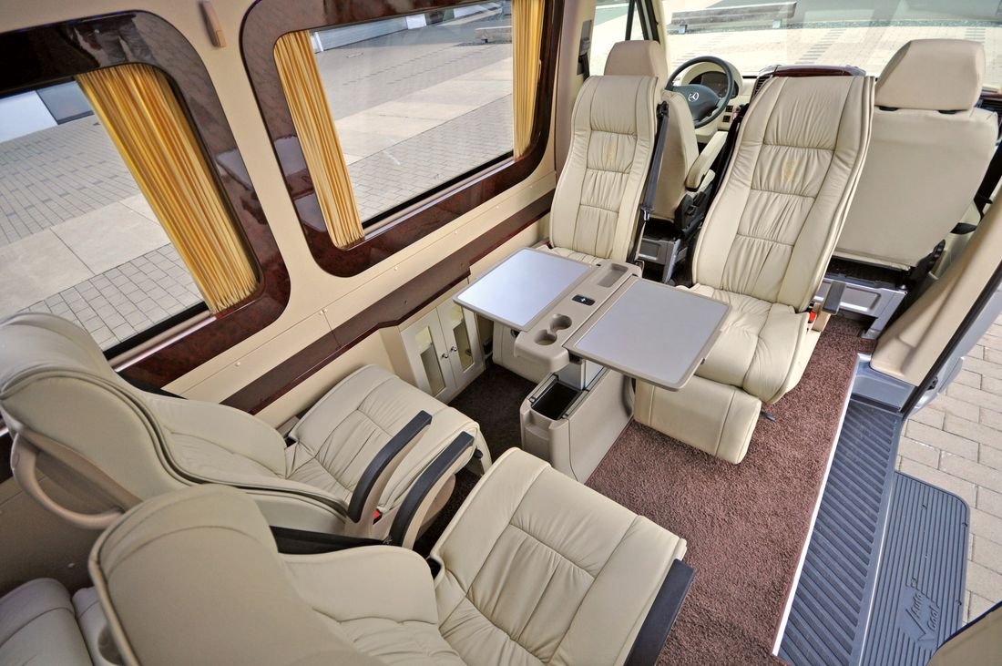 Rows of seats inside a passenger van